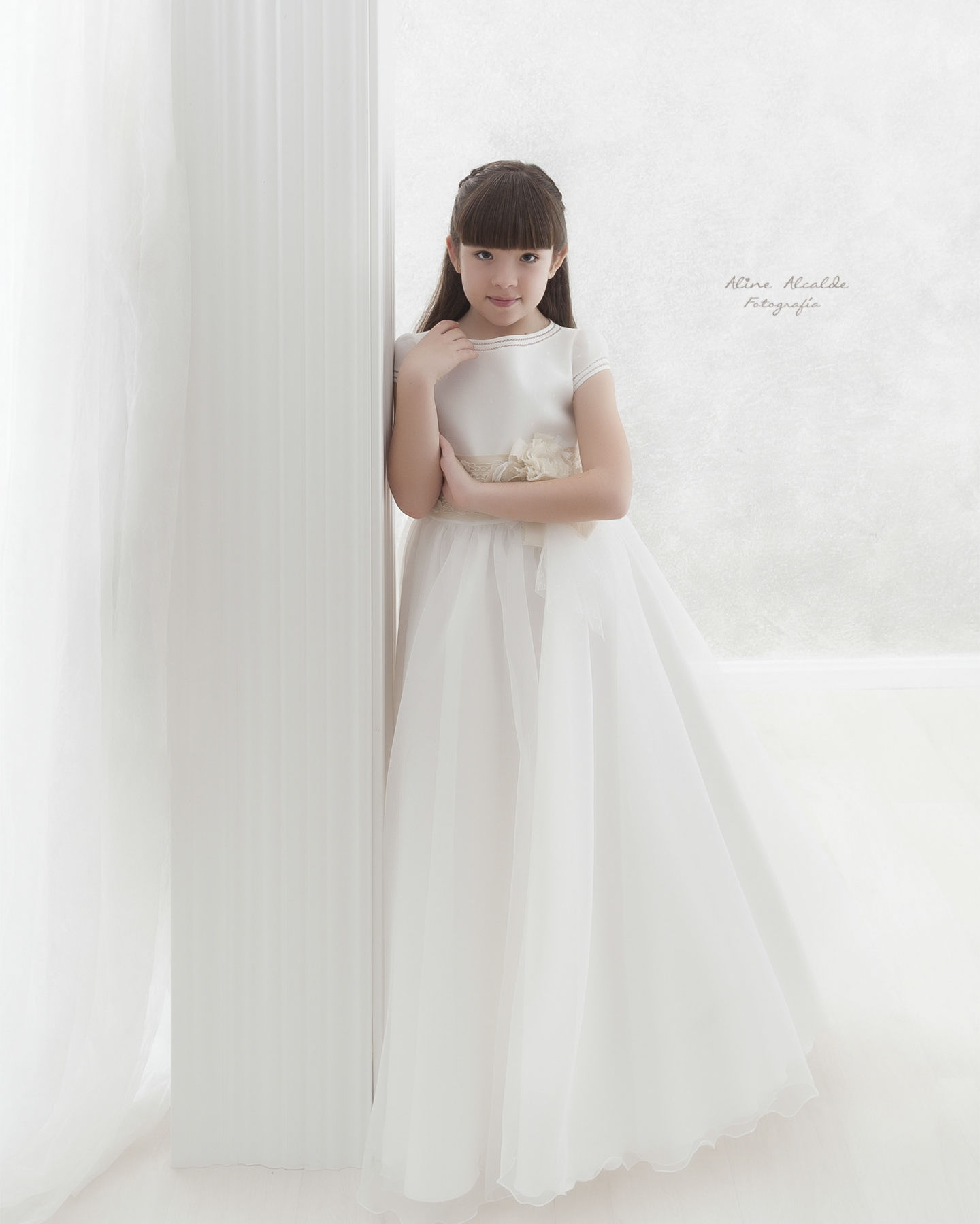 Aline Alcalde Fotografía - ninacomunionenblanco.jpg